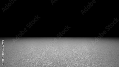 twinkling glitter background in black and white - sparkly glitter on a stage in a big spotlight