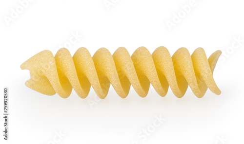 Uncooked fusilli pasta isolated on white background with clipping path photo