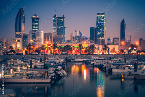 Skyline of Kuwait City at evening photo