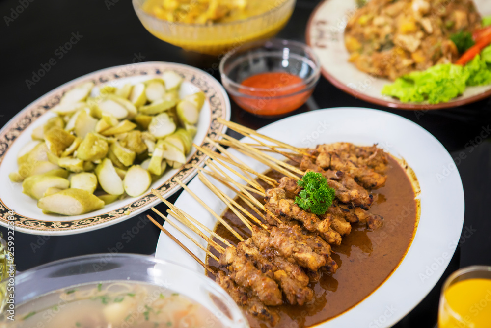 Assorted traditional Indonesian dishes on the table