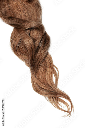 Long wavy brown hair on white background