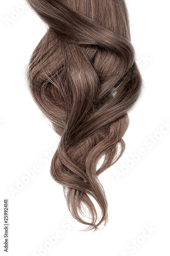 Long wavy brown hair on white background