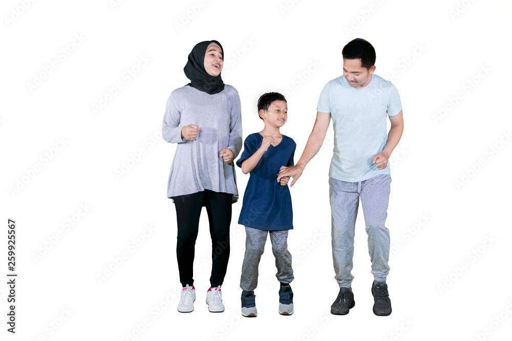 Muslim parents doing exercise run with their son Muslim parents doing exercise run with their son