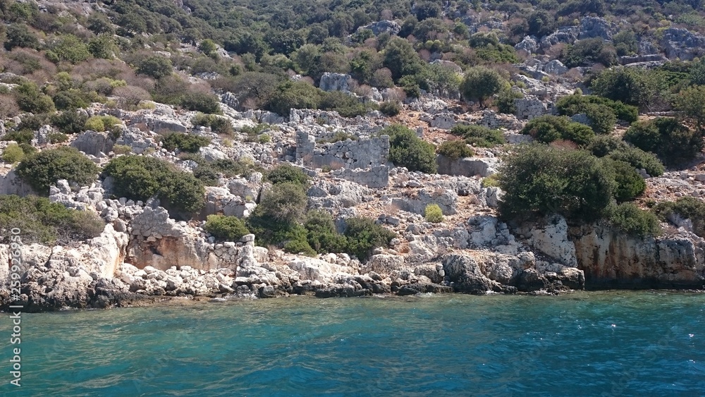 The sunken ruins on the island of Kekova Dolichiste of the ancient Lycian city of ancient Simena, was destroyed by an earthquake, rebuilt and existed until the Byzantine era. Antalya, Turkey.