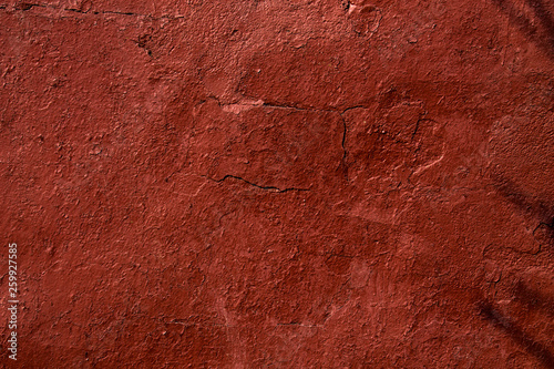 cracked wall painted red
