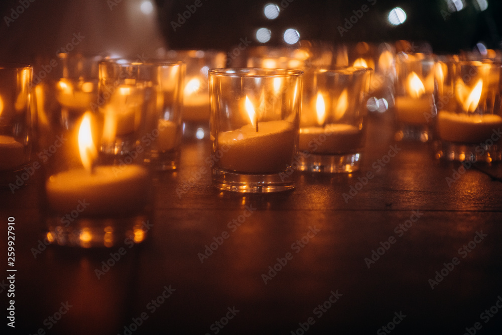 many candles glass jars sand holiday religion many candles glass jars sand holiday religion