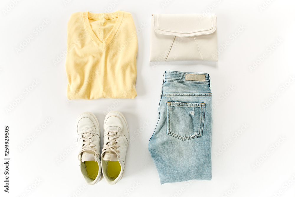 Woman clothes and accessories set on white background top view. modern and casual outfit. fashion, shopping and makeup concept. Flat lay, top view. Woman clothes and accessories set on white background top view. modern and casual outfit. fashion, shopping and makeup concept. Flat lay, top view.
