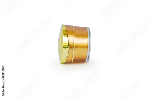 Gold face cream packaging on white background.With Clipping Path.