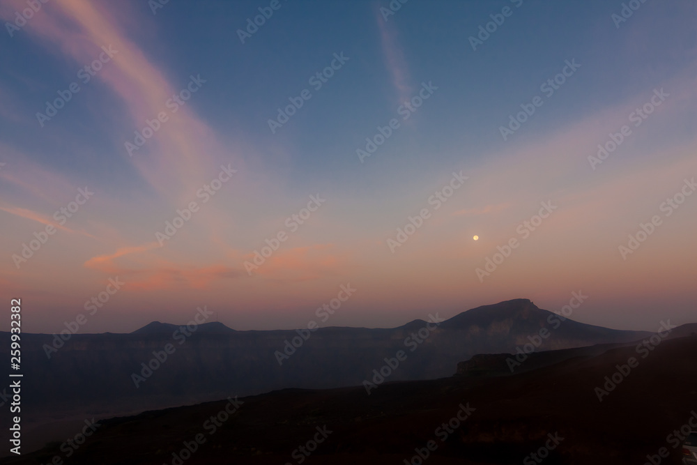 The moon rising over the Al Wahbah crater, Saudi Arabia The moon rising over the Al Wahbah crater, Saudi Arabia