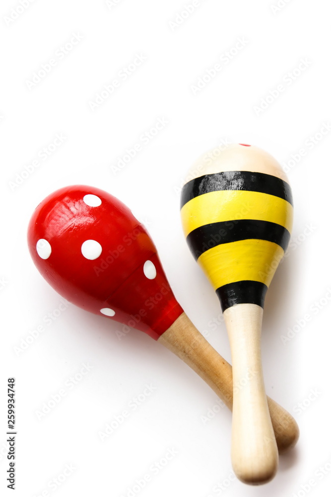 Maracas music instrument on white background.