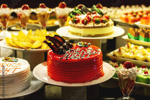 Showcase with many cakes