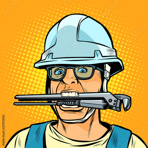 funny working professional plumber with a wrench