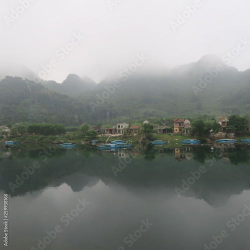 Beautiful river landscape in the National Park "Phong Nha" and the boats drive the tourists to the cave, March 2019, Central Vietnam