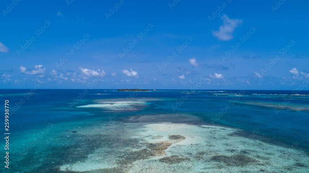 Aerial View to San Blas island of Panama. The San Blas islands of Panama is an archipelago comprising 365 islands and cays of which 49 are inhabited