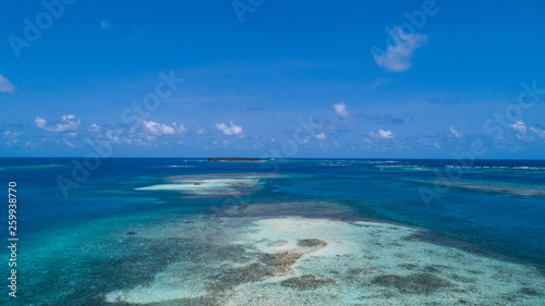 Fototapeta Naklejka Na Ścianę i Meble -  Aerial View to San Blas island of Panama. The San Blas islands of Panama is an archipelago comprising 365 islands and cays of which 49 are inhabited