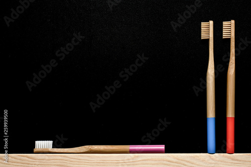 bamboo toothbrush on slate background. Place for text. Ecoproduct. eco-friendly. 