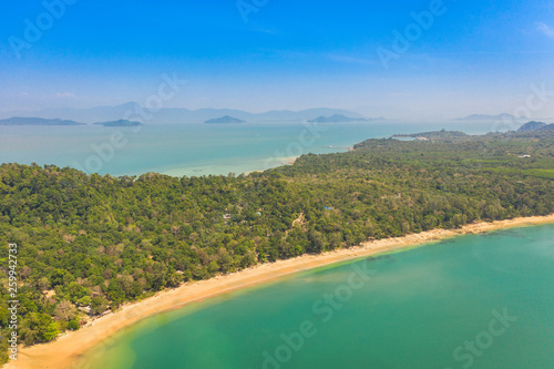 aerial photography above heaven beach at Buffalo Bay Phayam island Ranong Thailand. .there have emerald green sea and perfect coral reef