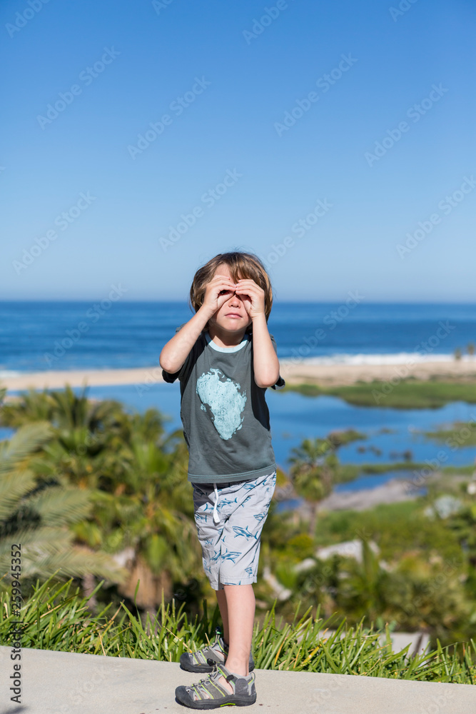 5 year old boy over looking Pacific Ocean, Todos Santos, Mexico 5 year old boy over looking Pacific Ocean, Todos Santos, Mexico