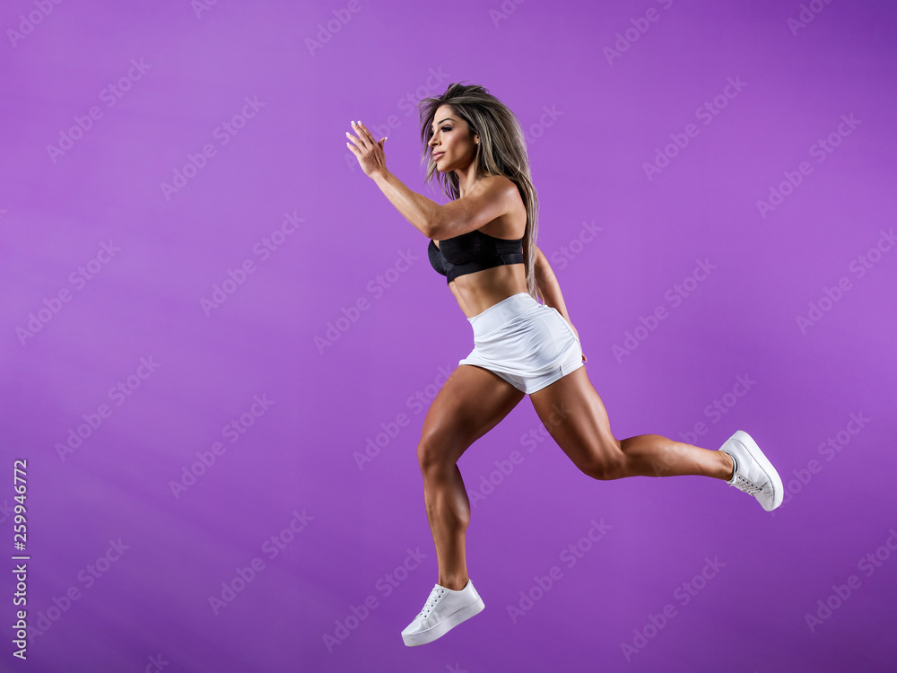 Athletic Woman Jump in the air, Running