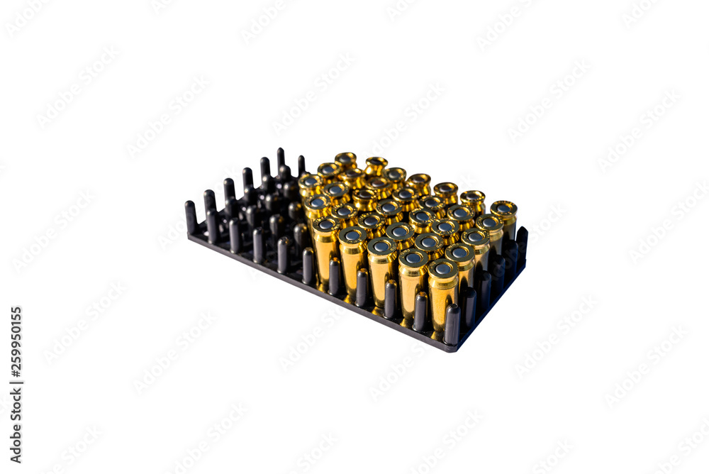 A lot of blind cartridges for guns in the package with 8mm caliber, isolated on a white background with a clipping path and space for text. A lot of blind cartridges for guns in the package with 8mm caliber, isolated on a white background with a clipping path and space for text.