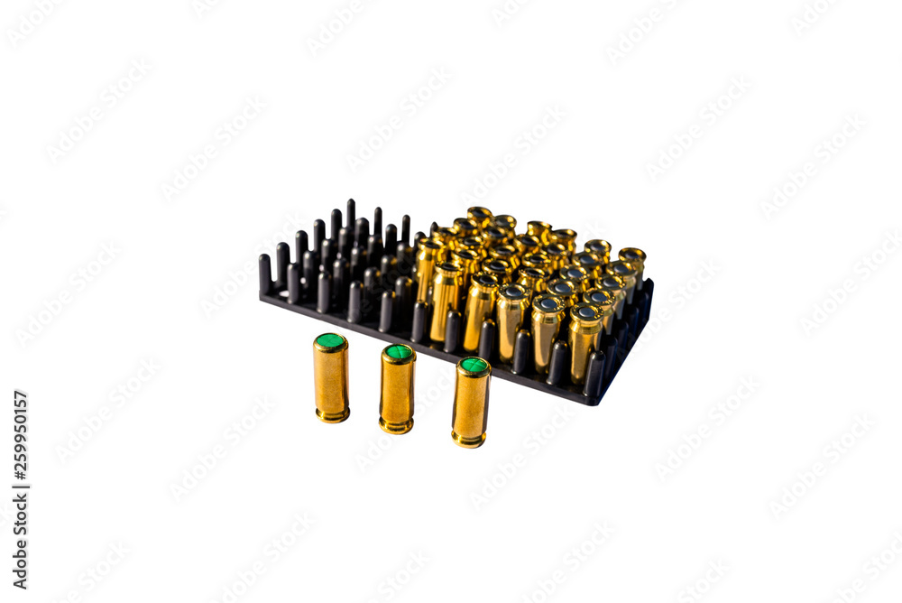 A lot of blind cartridges for guns in the package with 8mm caliber, isolated on a white background with a clipping path and space for text. A lot of blind cartridges for guns in the package with 8mm caliber, isolated on a white background with a clipping path and space for text.