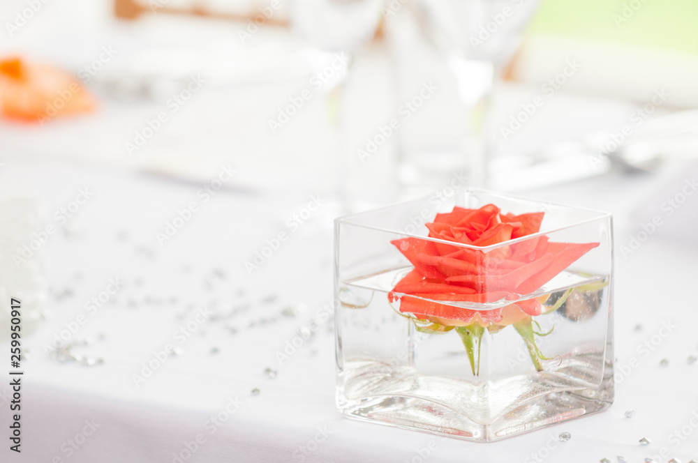 Floral ornament to decorate a wedding reception table Floral ornament to decorate a wedding reception table
