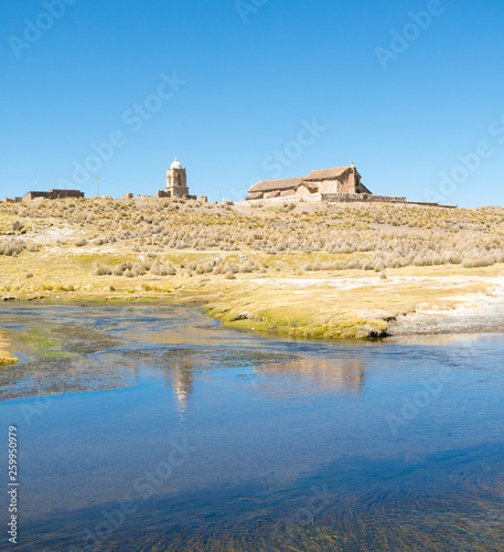 The small Andean town of Sajama, from the bank of the Sajama river. Bolivian Altiplano. Bolivia, South America