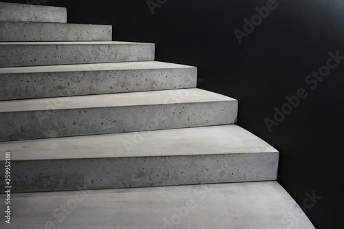 Concrete stairway black background. Abstract architecure. Abstractive background