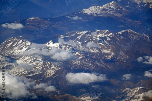 Alps mountains in spring  Italy. Aerial view from air plane