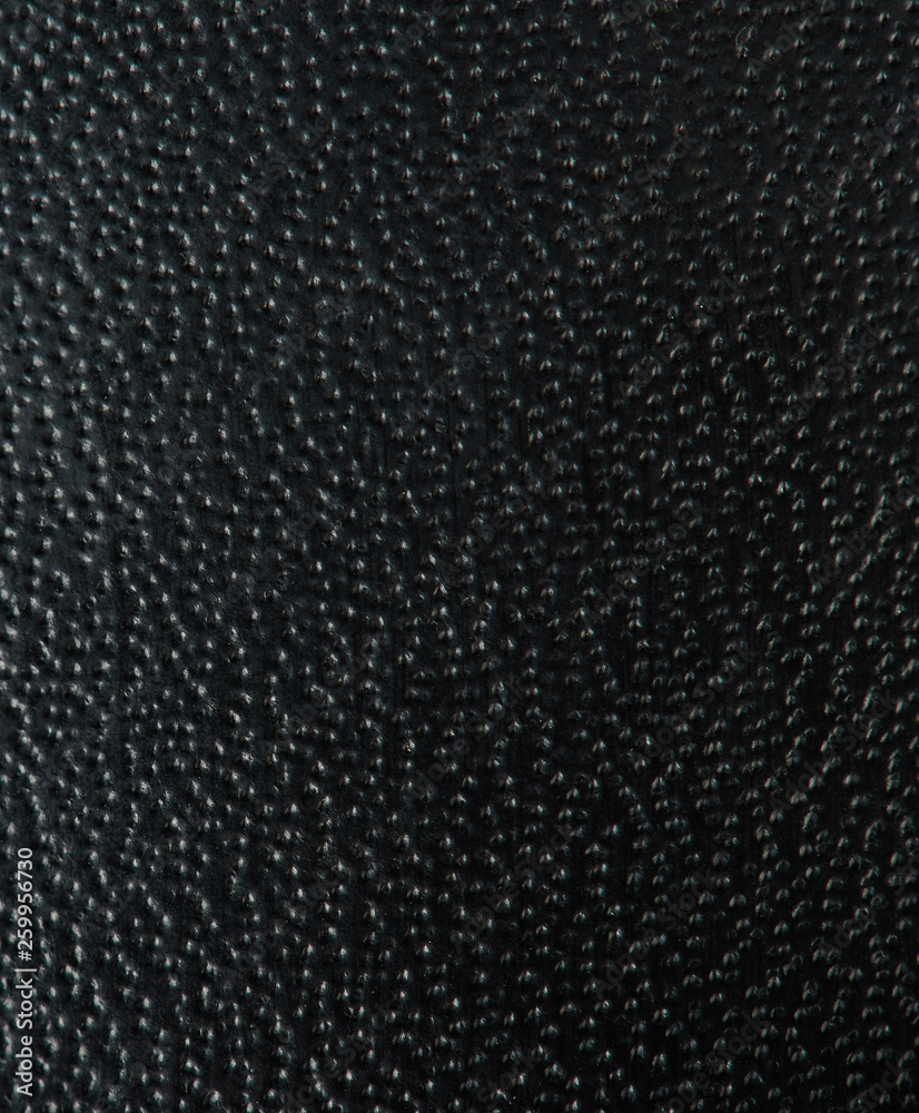 Black dotted leather texture background Black dotted leather texture background