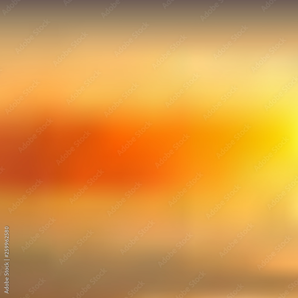 Abstract yellowish orange blurred background, sunset sky.
