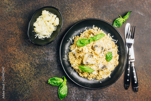 Italian risotto with mushrooms, parmesan cheeseand white wine. photo