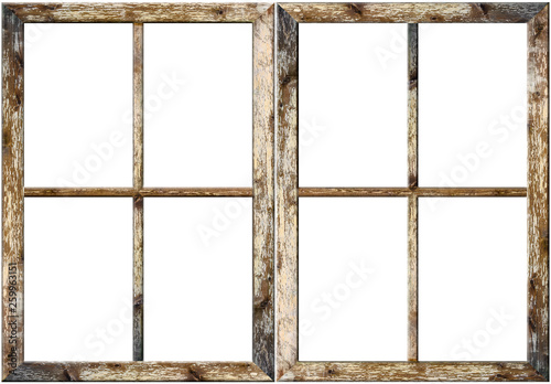 Very aged wooden window frame with cracked paint on it, mounted on a grunge wall