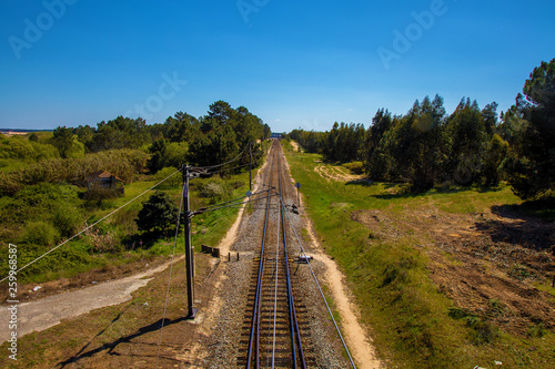 Top View Of a Rail Road Leading to The Horizon Line
