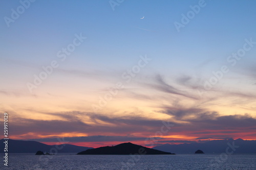 Seaside town of Turgutreis and spectacular sunsets with new moon