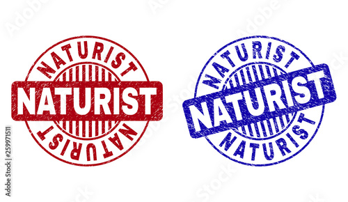 Grunge NATURIST round stamp seals isolated on a white background. Round seals with grunge texture in red and blue colors. Vector rubber overlay of NATURIST label inside circle form with stripes.