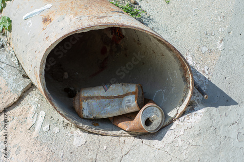 Can and Litter in Storm drain at park in West Hill, San Fernando Valley Los Angeles, CA