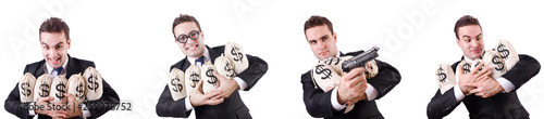 Businessman with money sacks and handgun 