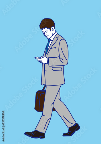 歩きスマホのビジネスマン