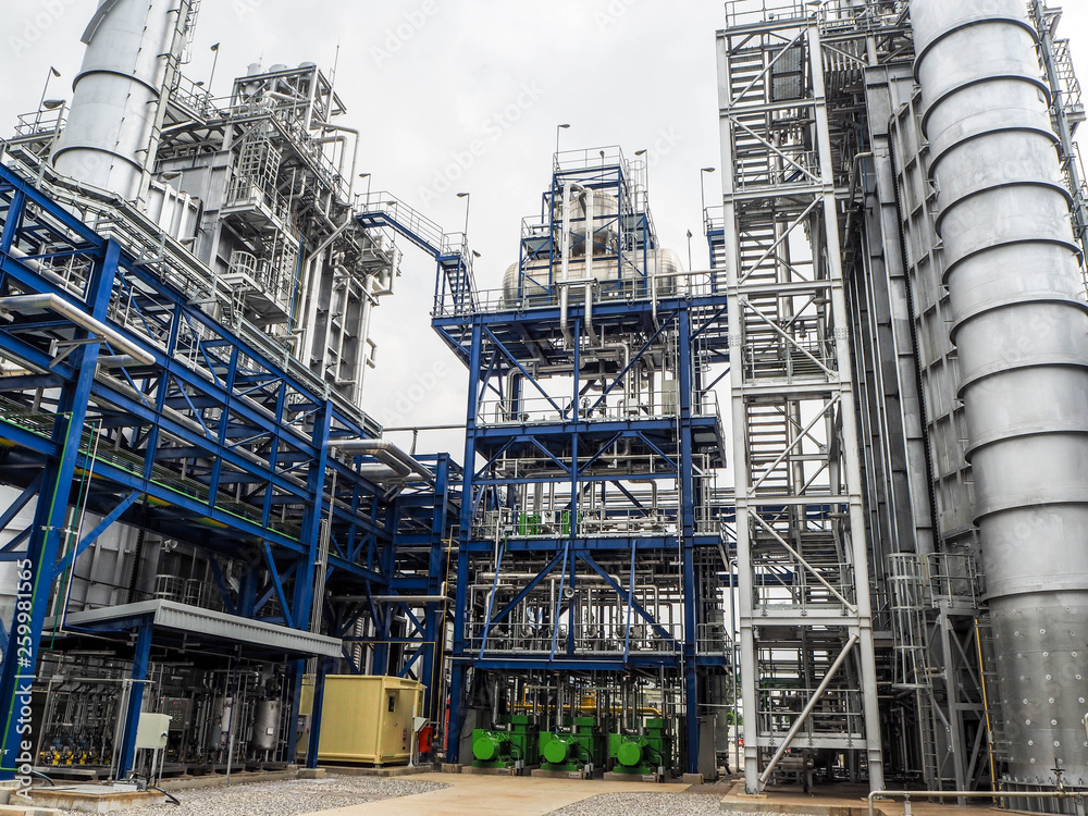 Heat recovery steam generator and sky in Combined-Cycle Co-Generation Power Plant which it so beautiful and popular to background power plant concept. Heat recovery steam generator and sky in Combined-Cycle Co-Generation Power Plant which it so beautiful and popular to background power plant concept.