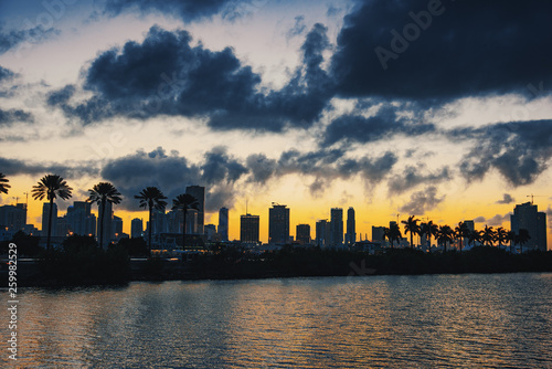 Dark clouds over Miami at sunset