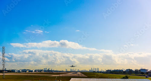 Jet airplane landing in Miami International Airport © Gabriele Maltinti