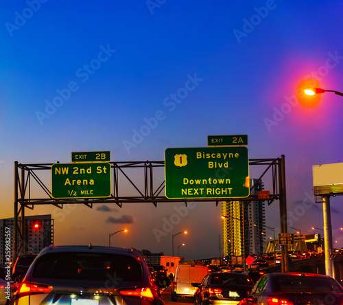 Traffic on MacArthur causeway heading to Miami Beach at sunset