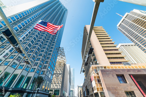 SKyscrapers and United States flag in downtown Miami