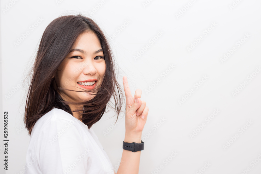 Beautiful asian wellness smiling women show welcome hand sign Beautiful asian wellness smiling women show welcome hand sign