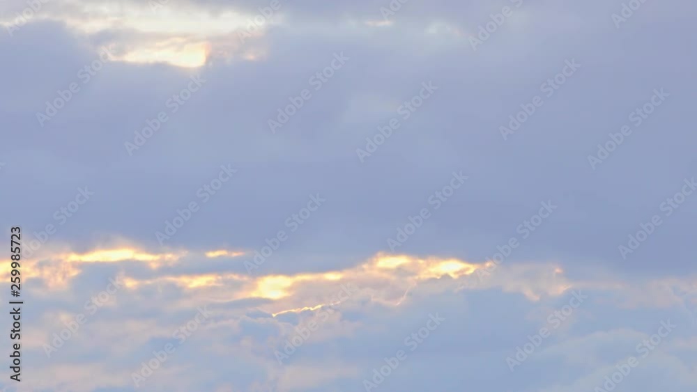 4K Timelapse. Through gently white, soft, fluffy, quickly passing clouds the sun's rays make their way. Ultra HD time lapse background. 4K Timelapse. Through gently white, soft, fluffy, quickly passing clouds the sun's rays make their way. Ultra HD time lapse background.