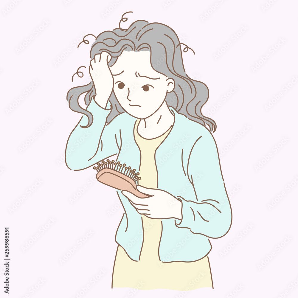 The woman combed her hair and found that she had hair loss The woman combed her hair and found that she had hair loss