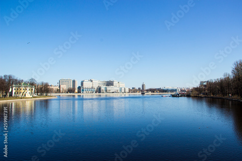 St. Petersburg, Russia, April 06, 2019: Neva river and view of Ushakovskaya embankment. Travel, architecture, sightseeing concept. © Светлана Стецива
