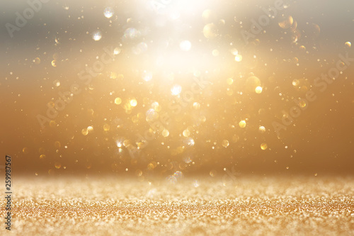 photo of gold and silver glitter lights background photo
