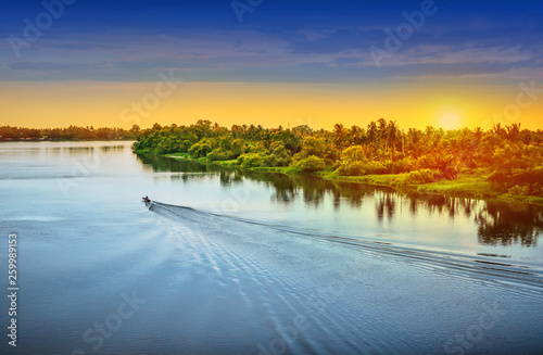 Landscapes boat at river sunset and blue sky background in Asia